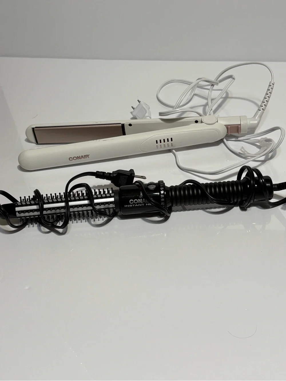 Bundle: 1 Conair White Hair Straightener and round heating brush.